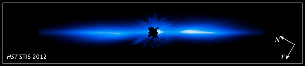 Hubble Space Telescope image shows a large, edge-on, gas-and-dust disk encircling the star Beta Pictoris. The light of the central star has been blocked out.